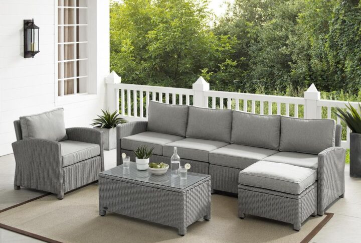 Lounge in comfort and style with the Bradenton 5pc Sectional Set. The sturdy steel frames of each piece are wrapped in beautiful all-weather wicker
