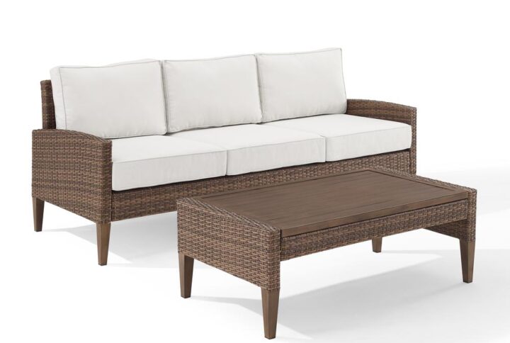 Bring coastal swagger to outdoor relaxation with the Capella 2pc Sofa Set. Blending cool neutral tones with natural finishes