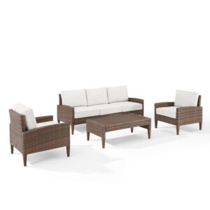 this set is sure to be the talk of the party. All-weather resin wicker and quick-drying olefin fabric come together to create durable outdoor seating. With a stylish mix of elements
