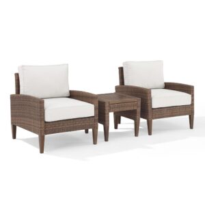Prepare to lounge and chat away in the Capella 3pc Outdoor Chair Set. Blending cool neutral tones with natural finishes