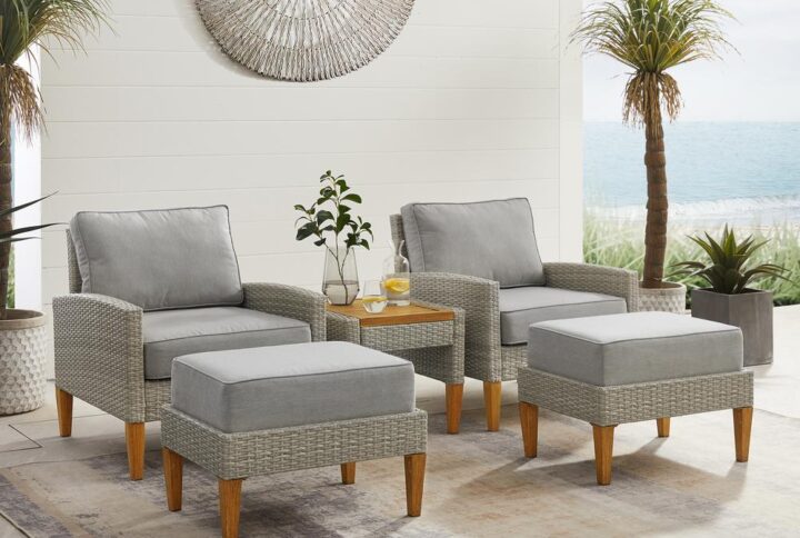 Prop up your feet and chat away with the Capella 5pc Outdoor Chair Set. Blending cool neutral tones with natural finishes