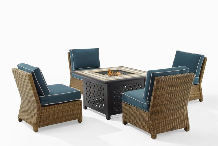 Gather around the fire for a relaxing evening with the Bradenton 5pc Conversation Set. Four all-weather resin wicker armless chairs surround a powder-coated steel fire table