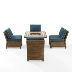 for cozy outdoor entertaining. Each chair features back and seat cushions covered in a solution-dyed polyester providing durability and comfort. The fire table's tiled stone top and lattice panel base offer a unique design that complements a variety of outdoor spaces. The gas controls and a rack for a propane tank are located inside the table's base