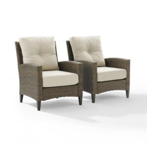 Lounge outdoors in classic style with the Rockport Patio Chairs (Set of 2). With high backs and gently arched arms