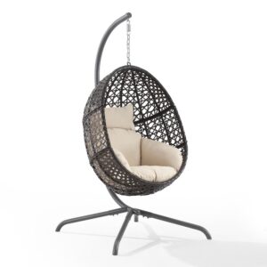 Add a laid-back boho vibe to your space with the Calliope Hanging Egg Chair. With all-weather rattan wicker over a steel frame