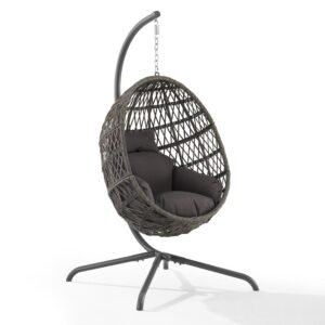 Indulge in the cozy bohemian style of the Tess Hanging Egg Chair. With all-weather rattan wicker over a steel frame