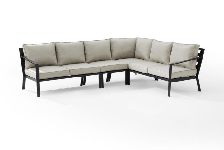 Create a comfortable lounge under the stars with the Clark 4pc Patio Sectional Set. Durable and modern