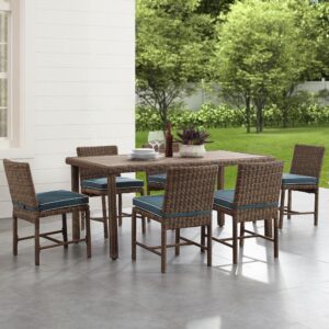 while the table showcases a durable poly lumber top. Offering seating for six diners