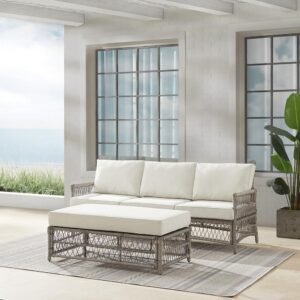 Create the look of an island retreat with the Thatcher 2pc Sofa Set. This set features sturdy steel frames wrapped in beautiful all-weather resin wicker and thick weather-resistant cushions. The coffee table ottoman is designed with versatility in mind. Add extra seating or prop up your feet with the included cushion