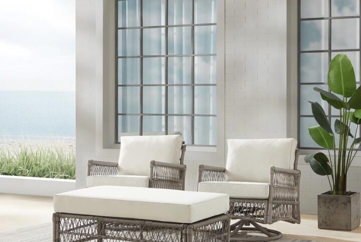 Create the look of an island retreat with the Thatcher 3pc Outdoor Rocking Chair and Ottoman Set. This patio set features sturdy steel frames wrapped in beautiful all-weather resin wicker and thick weather-resistant cushions. The rockers feature high-quality rocking and swivel bases for smooth