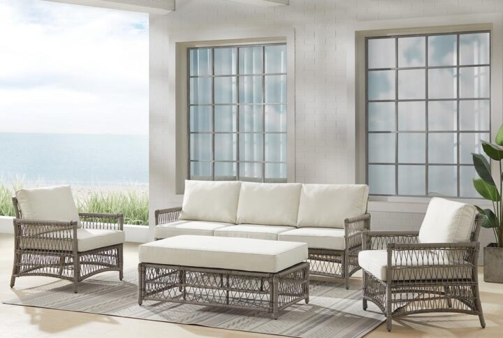 Create the look of an island retreat with the Thatcher 4pc Sofa Set. This set features sturdy steel frames wrapped in beautiful all-weather resin wicker and thick weather-resistant cushions. The coffee table ottoman is designed with versatility in mind. Add extra seating or prop up your feet with the included cushion