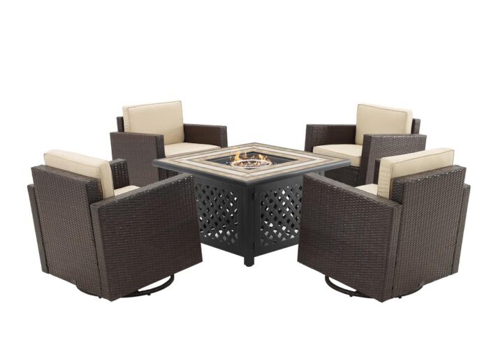 Enjoy an evening around the fire with the Palm Harbor 5pc Conversation Set. Each swivel rocker features a durable steel frame covered in all-weather resin wicker