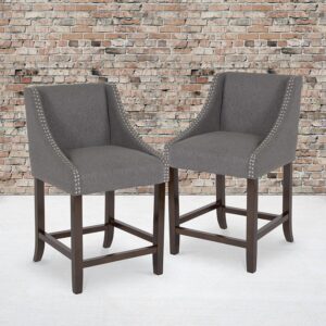 Bring warmth and comfort to your home while adding some world class elegance with this set of 2 classically sophisticated dark gray counter stools. Have breakfast at your kitchen island or hang out with friends around the dining room table in style. Boasting durable fabric upholstery paired with decorative nail head trim