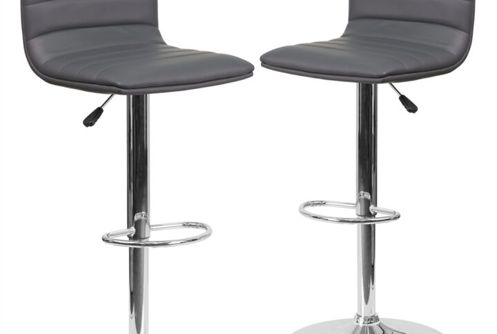 This modern barstool is upholstered in a durable vinyl upholstery and adjusts from counter to bar height. This armless design is gracefully contoured for your comfort. The height adjustable swivel seat adjusts from counter to bar height with the handle located below the seat. The chrome footrest supports your feet while also providing a contemporary chic design. To help protect your floors