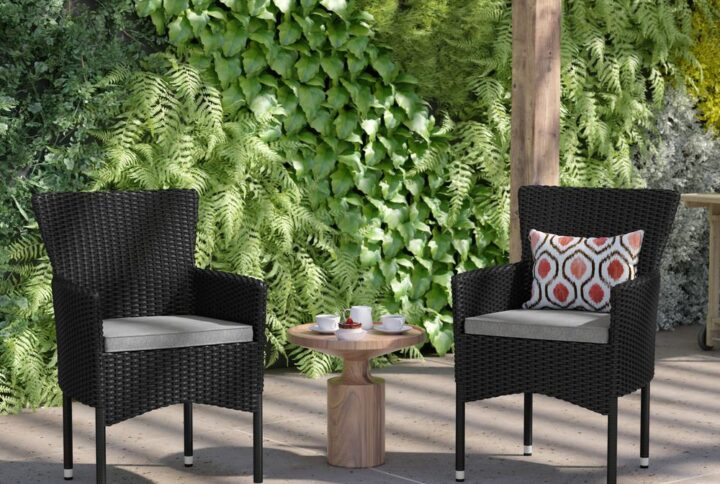 Relax in effortless comfort and style in this set of 2 wicker patio chairs with included plush high density foam cushions. A comfortably curved back gives extra support for lounging while the integrated armrests relieve tension from the neck and shoulders for truly restful seating. Featuring frames and cushions constructed from premium fade and weather-resistant materials