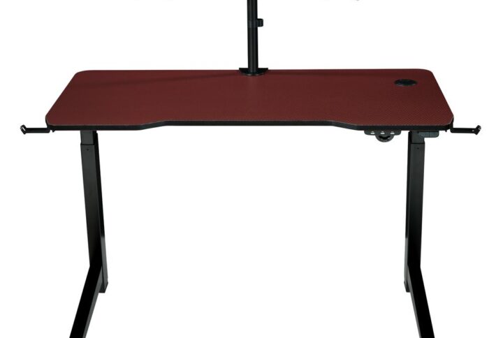 Elevate your gaming experience with our electric height adjustable standing gaming desk. Enjoy agile reaction time with our red carbon fiber fast-tracking mouse surface. Dual/Single 32" monitor mounts keep visuals at optimal positioning.  Adjust height with a push of a button and power up your devices where you choose with a magnetic USB power hub.  Immerse yourself in the competition with Bluetooth controlled RGB LEDs. Accessory hooks keep gaming surface cleared for action. Some assembly required.