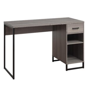 make this desk an ideal anchor for your home office. The Farm Oak finish and sturdy metal frame is durable and stylish. The box drawer with metal glides open smoothly and easily