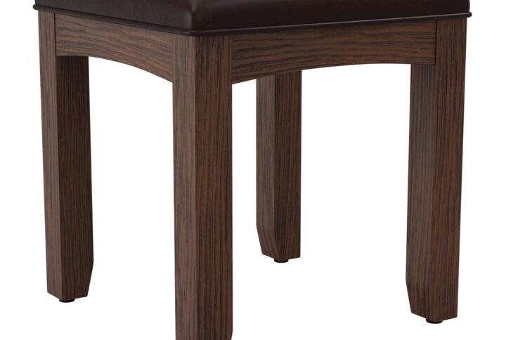 The Modern Mission Collection is an updated version of the traditional Craftsman design. The renewed look has enhanced darker hues in the finish with a deep oak grain look and feel. The five step finishing process is perfectly accented by the beauty of the new gunmetal hardware. The three drawer vanity is beneficial for storing your hair and makeup tools. A generous 44” wide table top provides a large working space and the included beveled mirror swivels 360 degree for adjustability. The matching vanity bench is made of solid wood and upholstered with a comfortable cushioned vinyl seat. Help ensure your morning preparations with the Modern Mission vanity and stool set.