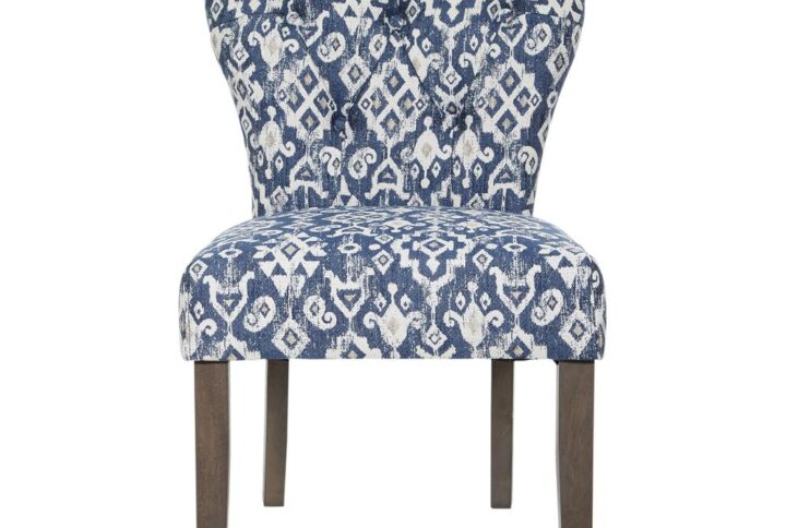 The traditionally classic Andrew Dining Chair provides premium comfort and lasting beauty to every home. Our accent chair with solid wood legs and button tufted back