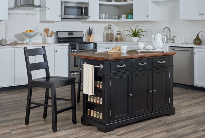 The Inspired by Bassett Country Kitchen Island Collection is constructed of solid hardwoods and engineered wood. Features include a convenient drop leaf that rises to provide dining and extra serving space. Also includes 3 easy glide