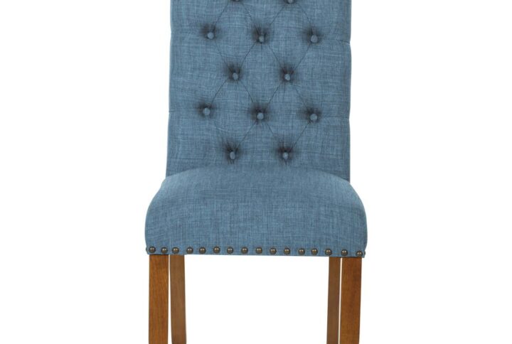 Elegantly sophisticated. You’ll be all set to host your first dinner party with these classic dining chairs. The timeless elegance of the 12 button tufted back and nailhead trim exudes modern sophistication