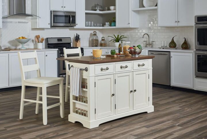 The inspired by Bassett country kitchen island collection is constructed of solid hardwoods and engineered wood. Features include a convenient drop leaf that rises to provide dining and extra serving space. Also includes 3 easy glide