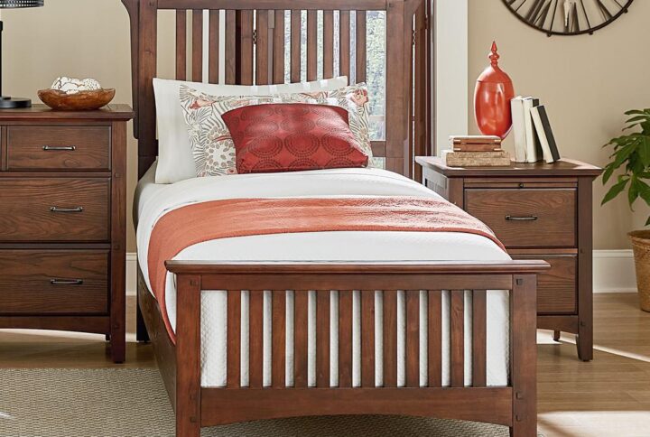 The modern mission collection is an updated version of the traditional craftsman design. The renewed look has enhanced darker hues in the finish with a deep oak grain look and feel. This twin bed is resiliently crafted with two side rails