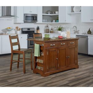The Inspired by Bassett Country Kitchen Island Collection is constructed of solid hardwoods and engineered wood. Features include a convenient drop leaf that rises to provide dining and extra serving space. Also includes 3 easy glide