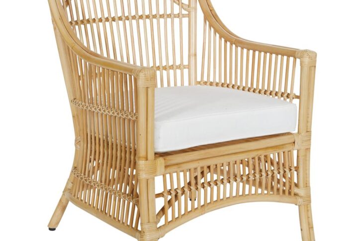 Bring the beauty of the islands to your home with the Maui Rattan Armchair with Cushion from OSP Home Furnishings™. Crafted of solid rattan