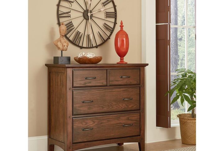 The Modern Mission Collection is an updated version of the traditional Craftsman design. The renewed look has enhanced darker hues in the finish with a deep oak grain look and feel. The five step finishing process is perfectly accented by the beauty of the new gunmetal hardware. The felt lined top drawer is helpful for storing away jewelry or delicates and the two deep storage drawers offer sizeable space for clothing or accessories. All drawers have heavy duty metal side glides for ease of opening and closing. Help ensure your morning preparations with the Modern Mission three drawer Chest .