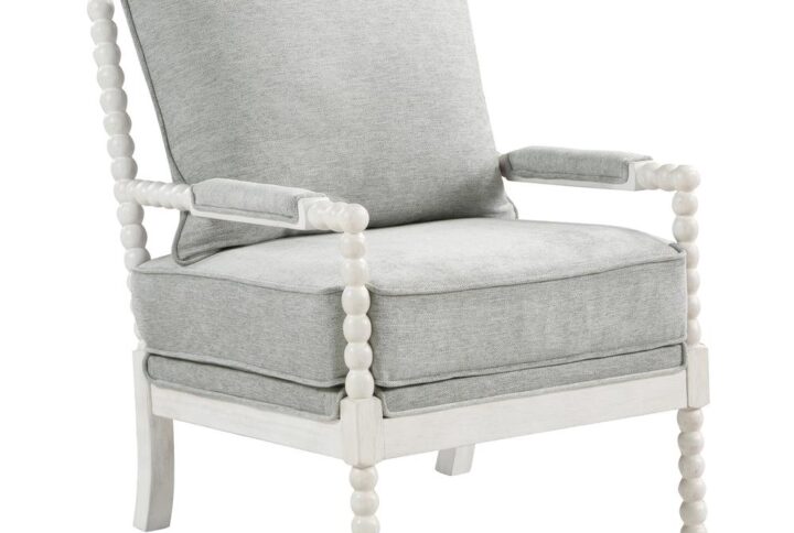 Create a designer feel to your décor with the classic Kaylee Spindle Chair. Deep