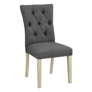 Farmhouse style with our 2-Pack button tufted dining chair. Charming nailhead trim and solid wood leg in a wash finish will create the coziest of nests. Gather these chairs around your dining table or set one in a guest room and one in front of a desk for a welcome seating option. Simple assembly keeps life easy and laid back.