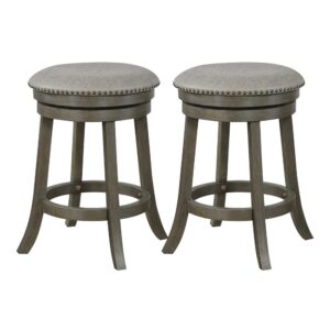 The Round Swivel Stool from OSP Home Furnishings is a nimble option for your home seating arrangements. Both swivel stools are made of solid wood. Each one having an attached footrest for comfort. Perfect for your guests while dining or just simply for fun! Don't you want more out of your chair? This swivel stool makes sitting down a unique experience.