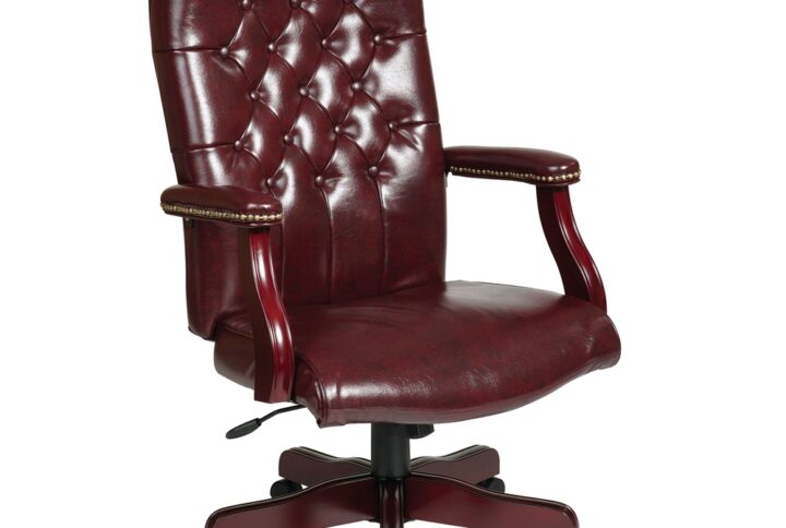 Traditional Executive Chair with Padded Arms. Thick Padded Seat and Back with Built-in Lumbar Support. One Touch Pneumatic Seat Height Adjustment. Locking Tilt Control with Adjustable Tilt Tension. Padded Armrests. Jamestown Oxblood Vinyl (-JT4). Mahogany Finish Wood Covered Steel Base with Dual Wheel Carpet Casters.