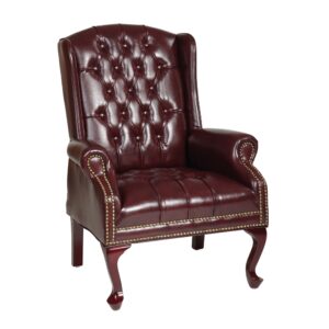 Traditional Queen Anne Style Chair. Thick Padded Seat and Back with Built-in Lumbar Support. Jamestown Oxblood Vinyl (-JT4). Mahogany Finish Wood Legs.