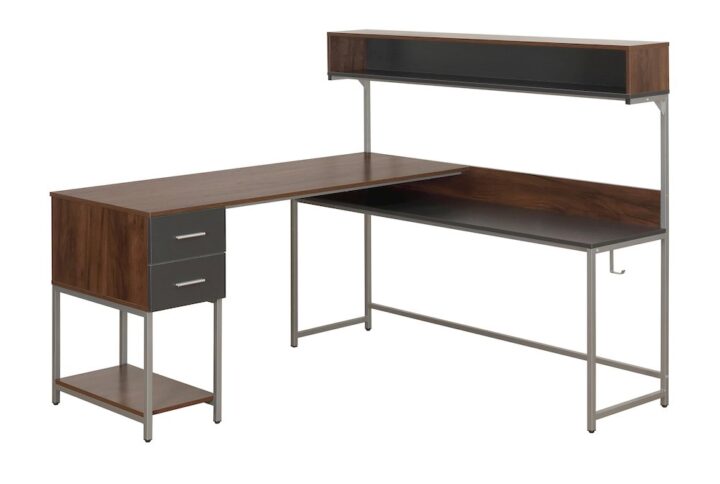 Transform your work area with this large industrial-style L-shaped workstation with hutch that combines a spacious desktop with under-desk shelf and storage. The engineered wood finish in vintage walnut and powder-coated steel frame ensures stability and durability. The extra side shelf