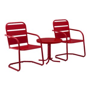 Bring modern vintage charm to your porch or patio with the Brighton 3pc Outdoor Chair Set. The vibrantly colored chairs surround a simple metal side table for a fun and functional outdoor lounging experience. Each patio chair features wide horizontal slats