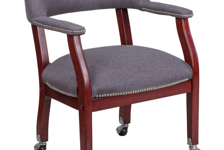 Add timeless charm to your space with this elegant reception/conference chair. This chair features gray fabric upholstery