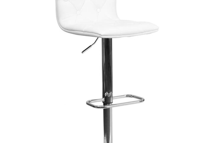 Classic style meets contemporary flair in this white adjustable height bar stool. Boasting attractive button tufted detailing with white vinyl upholstery