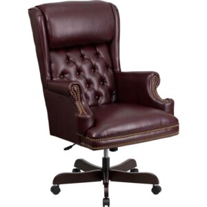 This button tufted burgundy executive office chair combines old world craftsmanship with 21st century ergonomic seating principles