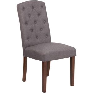 The classic design of this gray fabric upholstered parsons chair makes it a versatile seating option for your home. Button tufted detailing and a mahogany frame finish make them beautiful while high density foam padding and solid hardwood frame construction make them comfortable and durable. Parsons chairs are versatile and can be used not only in the dining room and kitchen but also as a reading chair or extra seating in the living room. The armless design gives the illusion of space which makes them great for small spaces. Vacuum or brush lightly to remove soil. Skirted chair covers can be used to soften their lines for living rooms and bedrooms. A parsons chair can be both formal or casual and are designed to go with almost any decor.