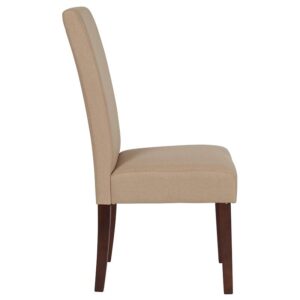 The classic design of this beige fabric upholstered parsons chair makes it a versatile seating option for your home. Sleek panel lined stitching and a mahogany frame finish make them beautiful while high density foam padding and solid hardwood frame construction make them comfortable and durable. Parsons chairs are versatile and can be used not only in the dining room and kitchen but also as a reading chair or extra seating in the living room. The armless design gives the illusion of space which makes them great for small spaces. Vacuum or brush lightly to remove soil. Skirted chair covers can be used to soften their lines for living rooms and bedrooms. A parsons chair can be both formal or casual and are designed to go with almost any decor.