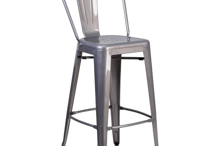 Instantly add an urban look and feel to your dining area with this clear coated metal bar stool with vertical slat back. This stool's curved