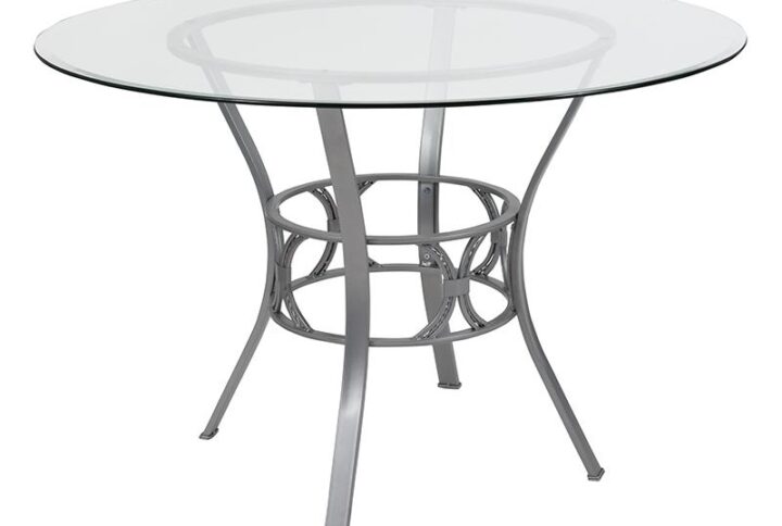 Building the perfect dining room is easier when you have a great foundation. Starting with an exquisite ornamental pedestal base this 45" glass topped dining table is off to a phenomenal start. Crowned by a round