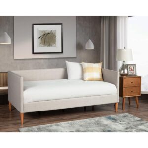this piece can be used as a bed or a place to just relax.  Covered in a Light Gray linen fabric and accented by Mid-Century style legs in an Acorn finish