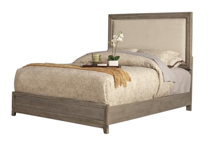 Style and elegance can be used to describe the Camilla wood panel bed.  Trendy Antique Gray finish while crafted with Plantation Mahogany wood Solids & Okoume Veneer.  The gorgeous upholstered headboard with nailhead trim compliments the other pieces in the Camilla bedroom collection.  Alpine Furniture knows that certain things never go out of style. Their furniture products are designed and constructed with classic English and/or French dovetailing that provides a sturdy result and an unbeatable aesthetic. For over 20 years