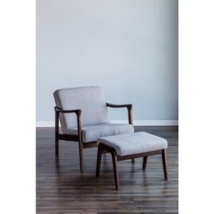 The Zephyr Slate Lounge chair features a solid wood frame. Its comfortable foam padded seat and durable Light Gray fabric upholstery makes it perfect for leaning into a boisterous conversation or reading your favorite book.  Add the matching footrest and quietly contemplating your next move. With a warm Medium Brown finish