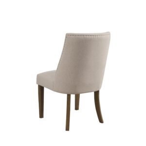 the Kensington Parson Dining Side Chair is wonderfully versatile and matches well with many dining room settings. Slightly angled legs and delicately tufted sides bring just enough visual attention. Its upholstered beige finish and curved back makes this chair very comfortable to sit in. This dining chair is constructed of recycled solid pine and a polyester fabric for a greener footprint and easy maintenance.