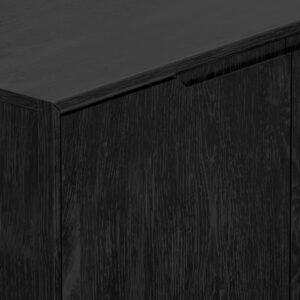 this sideboard features a timeless vintage black finish that complements any decor style. Constructed with mindy solids and veneer