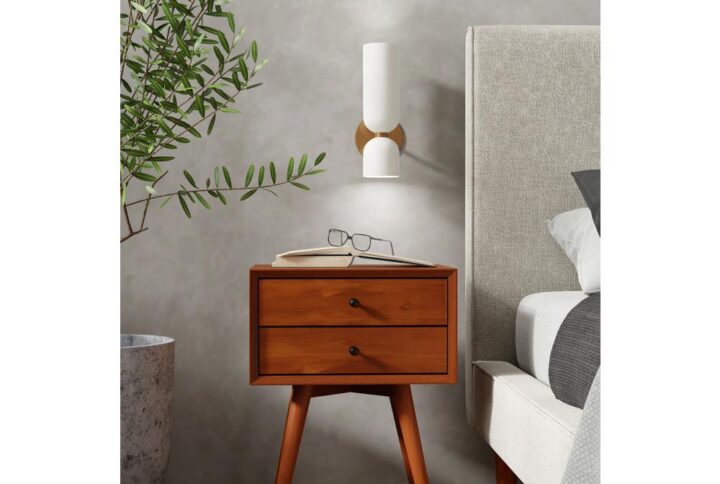 Transform your bedroom into a stylish haven with the Flynn Small Nightstand. Designed for lovers of mid-century modern aesthetics